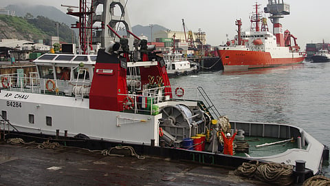 Tugs and other vessels at an unidentified port
