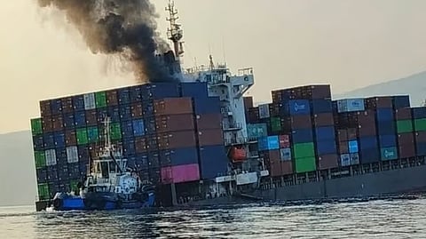 A container vessel believed to be the Singapore-registered GFS Pride on fire after she struck a mine in the Strait of Hormuz, October 14, 2026. The ship later sank though her entire crew were all safely rescued.