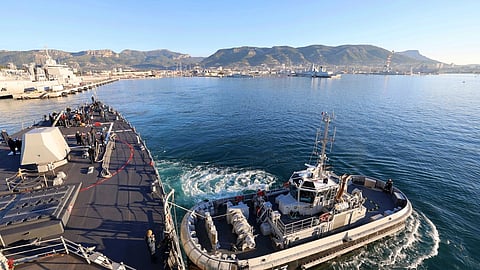 The US Navy Arleigh Burke-class guided-missile destroyer USS Roosevelt departs Toulon Naval Base in France during a sea-and-anchor evolution, October 11, 2025.