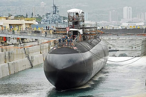 Dry Dock 1 at Pearl Harbor Naval Shipyard is flooded during the undocking of the US Navy Los Angeles-class fast attack submarine USS City of Corpus Christi, May 18, 2010. (Photo: US Navy/Machinist's Mate 3rd Class Dustan Longhini)