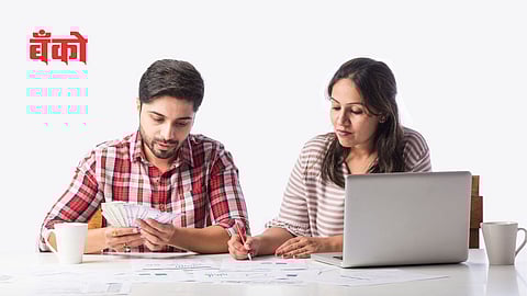 couple discussing about income tax and money expnse