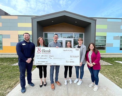 TS Bank donates $10,000 to emergency family homeless shelter MICAH House for a new childcare center. 