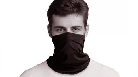 person covering face with hand kerchief