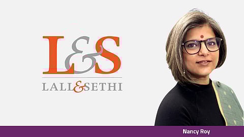 Nancy Roy with logo of Lall & Sethi