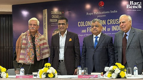 (L-) Rakesh Dwivedi, former CJI DY Chandrachud, SG Tushar Mehta and Senior Advocate Kapil Sibal at the book launch
