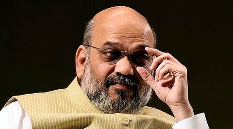 Ahmedabad: National president of BJP Amit Shah during the Jain International Trade Organization saluting and contributing to the families of martyrs, in Ahmedabad, Sunday, March 03, 2019. (PTI Photo/Santosh Hirlekar)(PTI3_3_2019_000153B)