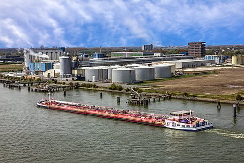 Rotterdam port, barge, storage tanks