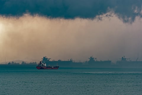 Off Singapore, rain clouds, vessels