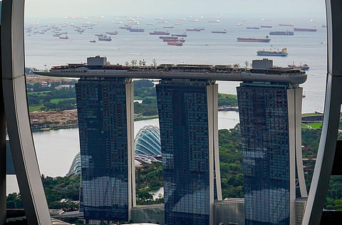 Photo of Marina Bay Sands with ships in the background