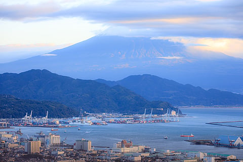 Photo of port in Japan with Mt Fuji in background