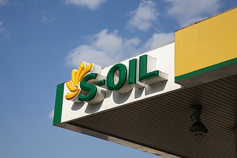 Photo of S-Oil logo sign on petrol station in South Korea