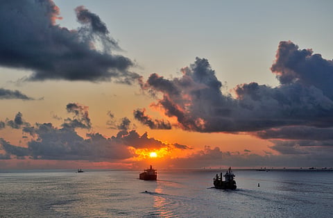 Photo of vessels in Atlantic Ocean at sunset