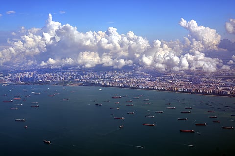 Photo of aerial view of vessels in waters off Singapore