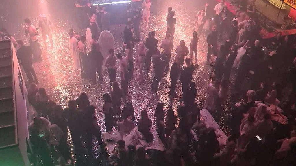 Russian Court Fines TV Presenter Who Threw 'Almost Naked Party' REUTERS