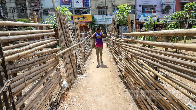 People do not have access to the park except for a walkway as local influential people have built a bamboo fence to grow papaya. Photo: Asif Mahmud Ove