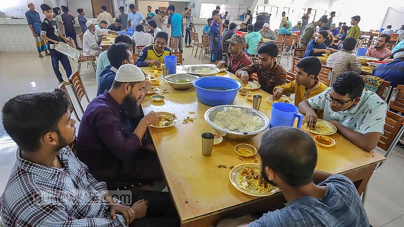 Students eat at the Haji Muhammad Mohsin Hall canteen at Dhaka University.