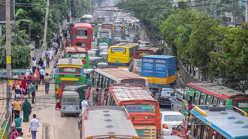 The early morning rush triggered by the decision to bring forward office times by an hour to save power leads to traffic congestion in Dhaka's Shyamoli on Wednesday, Aug 24, 2022.