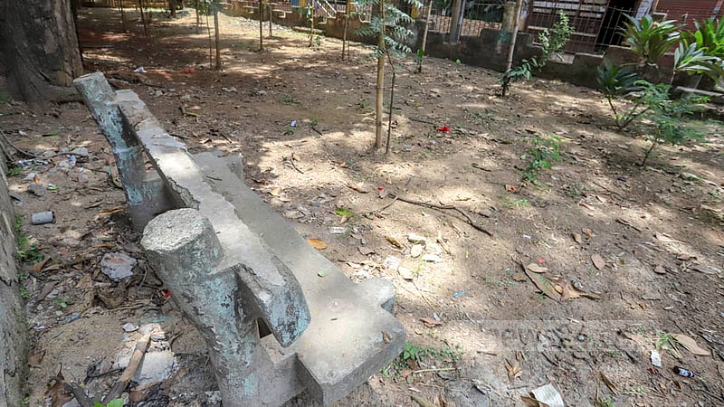 The dust has accumulated on the benches of a locked park of Dhaka North City Corporation between Block D and E of Mirpur 12. Photo: Asif Mahmud Ove