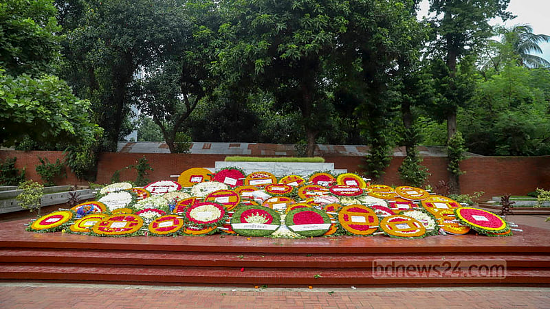 The grave of national poet Kazi Nazrul Islam is covered with floral wreaths on his 46th death anniversary on Saturday, Aug 27, 2021.