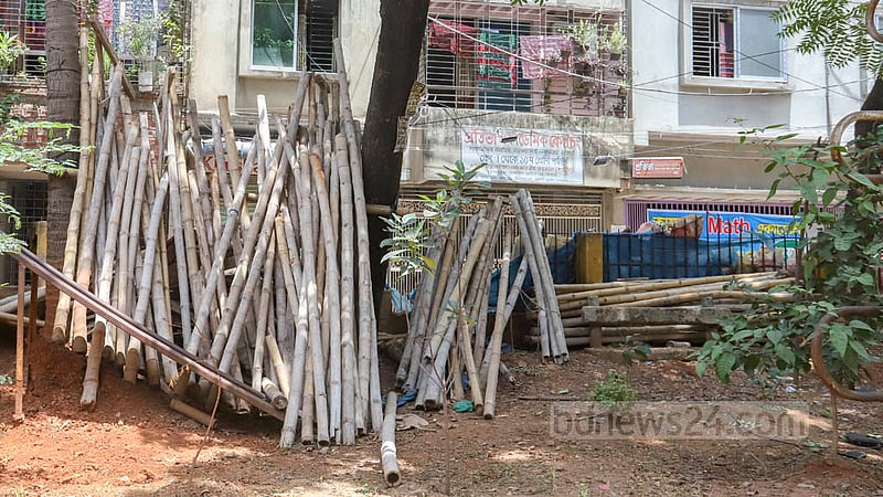 The bamboo used for construction is kept inside a locked park of Dhaka North City Corporation between Block D and E of Mirpur 12. Photo: Asif Mahmud Ove