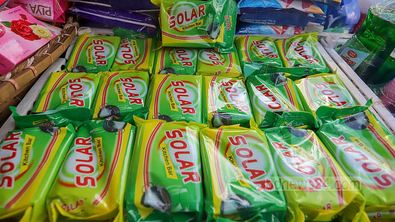 Low-quality dishwashing bars are on display at a street shop in Dhaka.