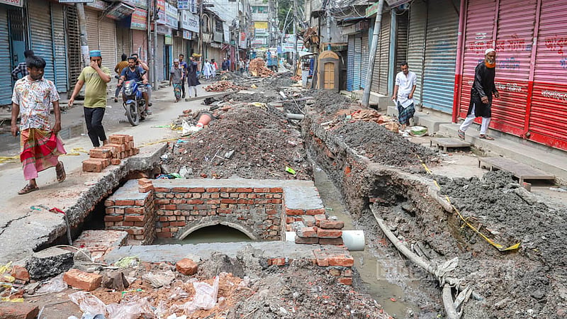 The renovation work on Old Dhaka’s Naya Bazar Road has been ongoing for a long time to install new sewage and water pipes.
