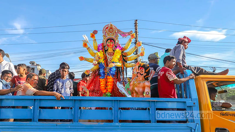 Idols of Hindu goddess Durga are brought to the banks of the Buriganga in Dhaka for immersion on Bijoya Dashami on Wednesday, Oct 5, 2022.