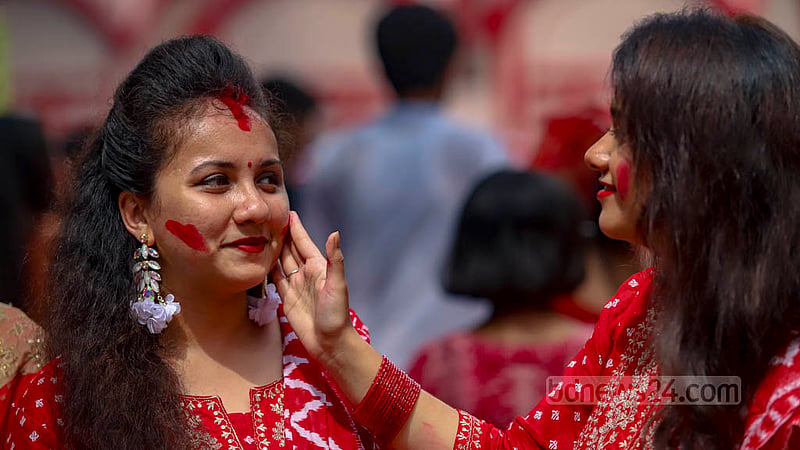 Two Hindu women take part in a ritual called ‘Sindoor Khela’ or vermilion sprinkling on Bijoya Dashami at Dhakeshwari National Temple on Wednesday, Oct 05, 2022.