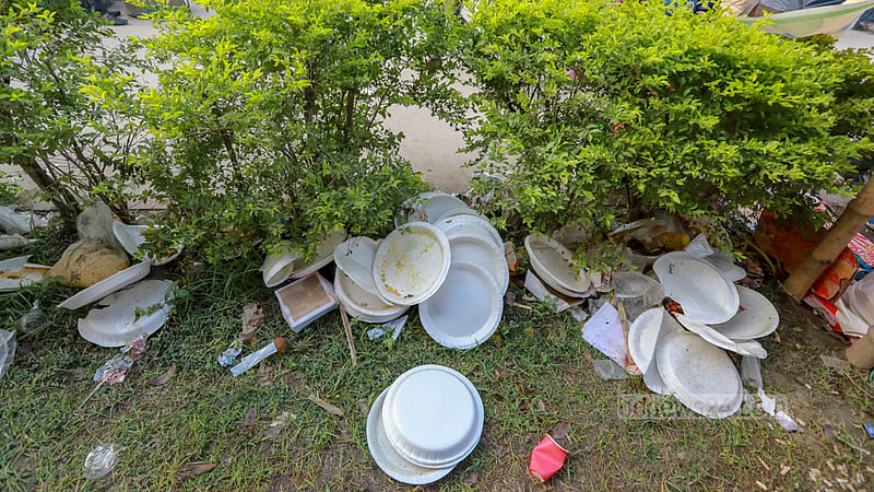 The shrine of Fakir Lalon Shah is littered with single-use plastic plates after a programme marking his 132nd death anniversary in Kushtia's Chheuriya. Plastic waste is posing an increasing threat to the environment in rural areas. Photo: Mostafigur Rahman