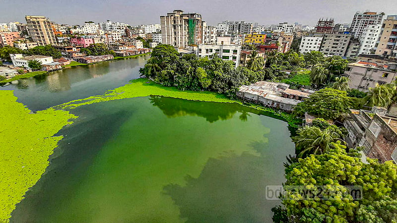 Encroachers have built tin shacks on bamboo frames on the water of the lake at Chowdhurypara in Dhaka’s Khilgaon.