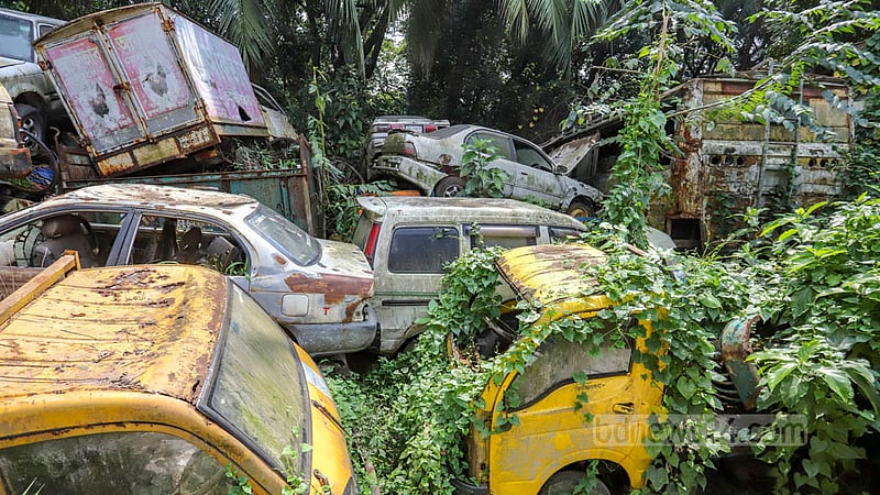 Many vehicles are now engulfed in weeds as they have been left to rot under the open sky at Shahbagh Police Station’s dumping ground in Suhrawardy Udyan.