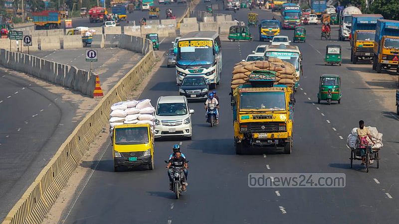 A motorcyclist is seen riding on the Dhaka-Chattogram Highway without wearing a helmet. Helmets are mandatory for both motorcyclists and pillion riders.