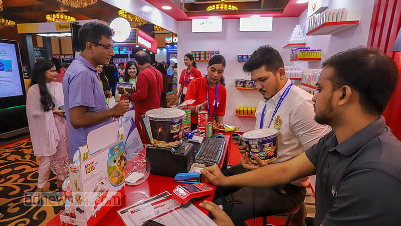 Visitors look at products at a stall in the 28th US Trade Show organised by the American Chamber of Commerce on Thursday, Oct 27, 2022.