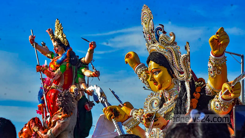 Hindu devotees bid farewell to goddess Durga with tears and love on Bijoya Dashami.
