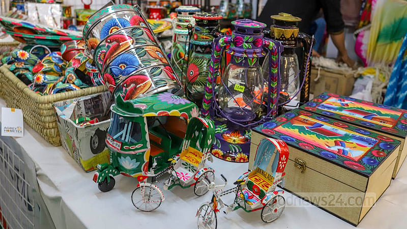 Showpieces of rickshaw paint are on display at a stall of National SME Product Fair 2022 at Bangabandhu International Conference Centre on Thursday, Nov 24, 2022. Photo: Asif Mahmud Ove