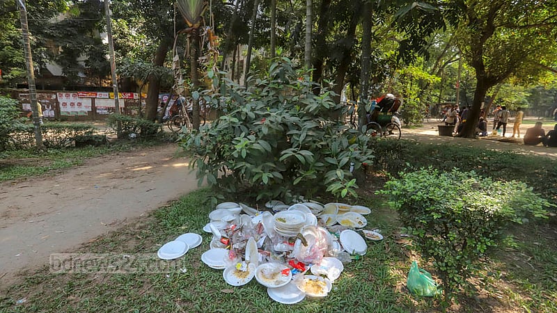 Plastic waste is piled up in front of the Faculty of Business Studies at Dhaka University, consisting of plates and boxes thrown away by supporters and leaders of the Jubo League attending an anniversary programme, Nov 12, 2022. Photo: Asif Mahmud Ove