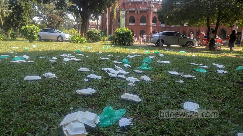 Jubo League supporters and leaders left behind plastic plates and boxes at Dhaka University’s Curzon Hall after attending an anniversary programme on Saturday, Nov 12, 2022. Photo: Asif Mahmud Ove