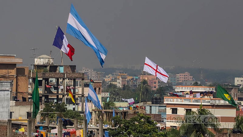 Football fans in Amin Bazar decorated their rooftops with flags to celebrate the World Cup. Photo taken on Sunday, Nov 20, 2022. Photo: Asif Mahmud Ove
