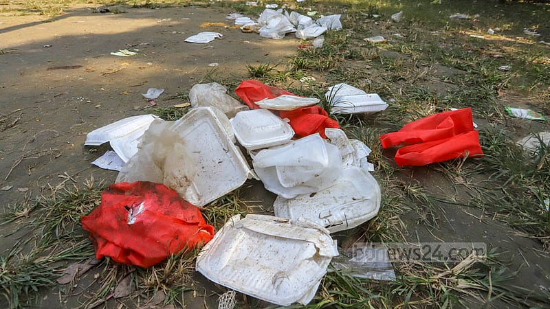 Supporters and leaders who attended a Jubo League anniversary at Suhrawardy Udyan littered the Mohsin Hall playground and other locations of the campus with plastic waste with little care on Saturday, Nov 12, 2022. Students continue their game ignoring the pile beside them. Photo: Asif Mahmud Ove