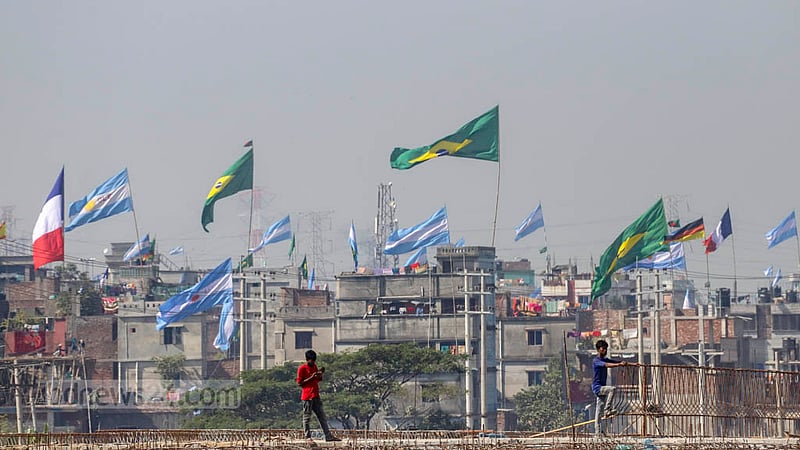 Flags of different countries taking part in the World Cup reflect the football fever gripping the country. Photo taken on Sunday, Nov 20, 2022. Photo: Asif Mahmud Ove