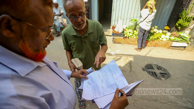 Titas Gas officials travel to different homes in the East Nakhalpara area to assess unpaid bills and stoves connected illegally to the gas supply on Monday, Nov 14, 2022.