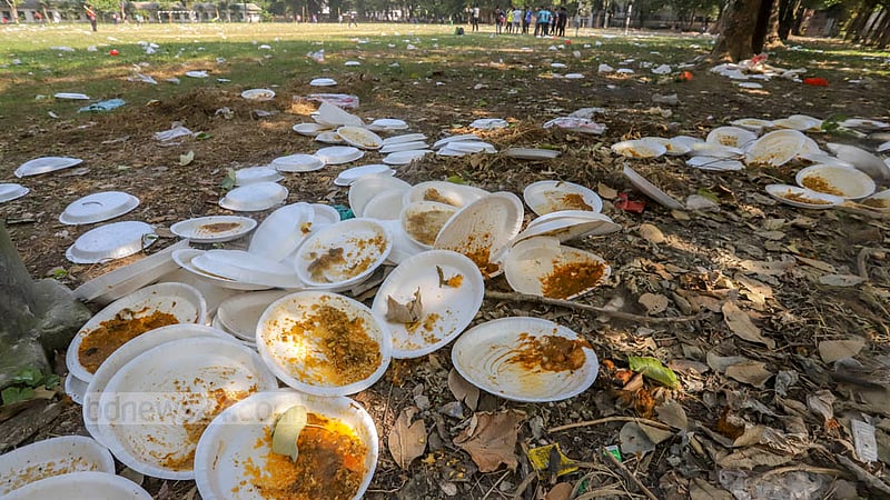 Hundreds of discarded plastic objects, including food boxes and plates, lie around the Mohsin Hall playground on the Dhaka University campus at a time when environmental pollution stemming from such waste is becoming an alarming issue, Nov 12, 2022. Photo: Asif Mahmud Ove