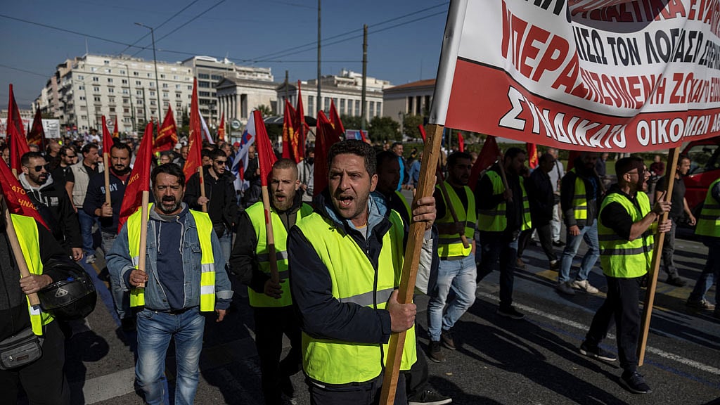 Thousands march as Greeks strike over 'suffocating' inflation