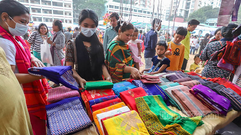 Handloom products are on display at a stall during Garo harvest festival Wangala at Banani Bidyaniketan on Friday, Nov 18, 2022. Photo: Asif Mahmud Ove