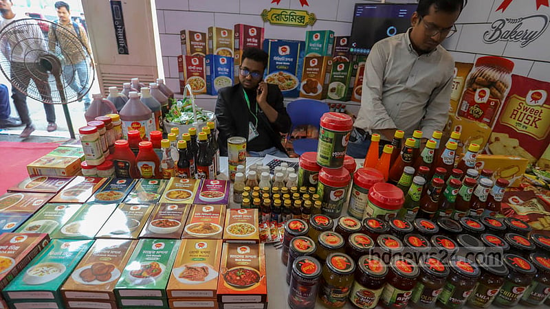 Food items are on display at a stall of the 10-day National SME Product Fair 2022 at Bangabandhu International Conference Centre on the opening day on Thursday, Nov 24, 2022. Photo: Asif Mahmud Ove