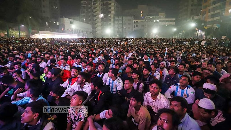 Bangladeshi football fans gather in Old Dhaka’s Balur Mathh in the small hours of Wednesday, Dec 14, 2022 to watch on the big screen the first semifinal of the FIFA World Cup in Qatar between Argentina and Croatia.