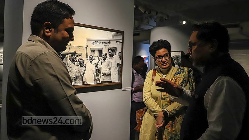 Visitors take a tour of the “Witnessing History in the Making: Photographs by Anne de Hemming” exhibition organised by CRI and Samdani Art Foundation on Thursday, Dec 15, 2022.