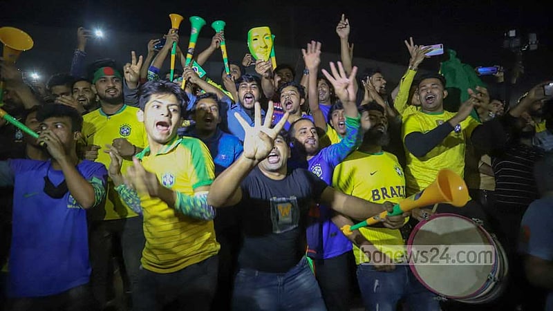 Bangladeshi fans at Dhaka University’s TSC celebrate Brazil’s win over South Korea in their last 16 clash of the Qatar World Cup.