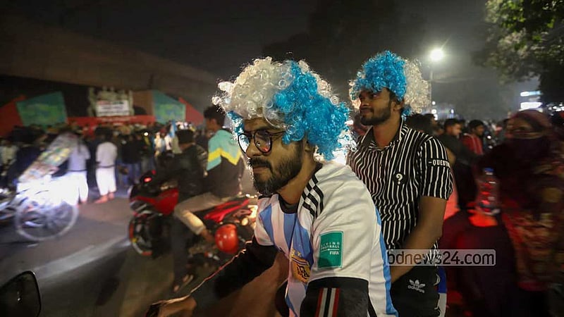 Fans leave Haji Muhammad Mohsin Hall ground at Dhaka University as the authorities stop exhibiting Qatar World Cup matches on the big screen.