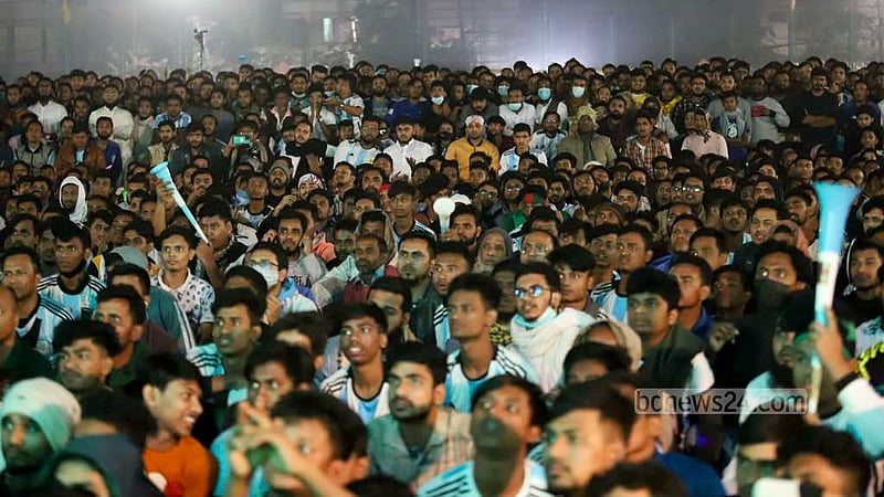 Bangladeshi football fans gather in Old Dhaka’s Balur Mathh in the small hours of Wednesday, Dec 14, 2022 to watch on the big screen the first semifinal of the FIFA World Cup in Qatar between Argentina and Croatia.